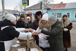 27 января у входа в городской парк Усмани проходила акция «Блокадный хлеб»